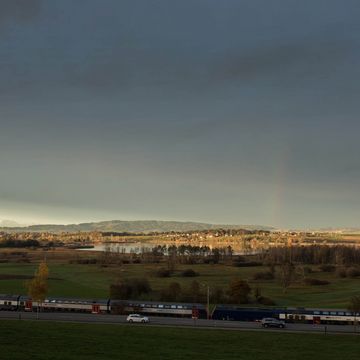 Regenbogen Stimmung über See